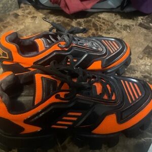 Prada Vibrant Orange and Black cloudbursts